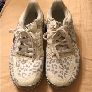 Nike white cheetah print tennis shoes